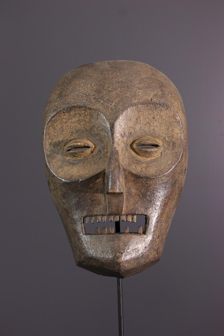 Nganga Kongo Yombe wood mask - DRC Congo - African Art: Title: Nganga Kongo Yombe wood mask - DRC Congo - African Art Tribal Art Description: A panage of the nganga, the kongo soo-priest, this two-coloured African mask uses kongo characters such as the pie