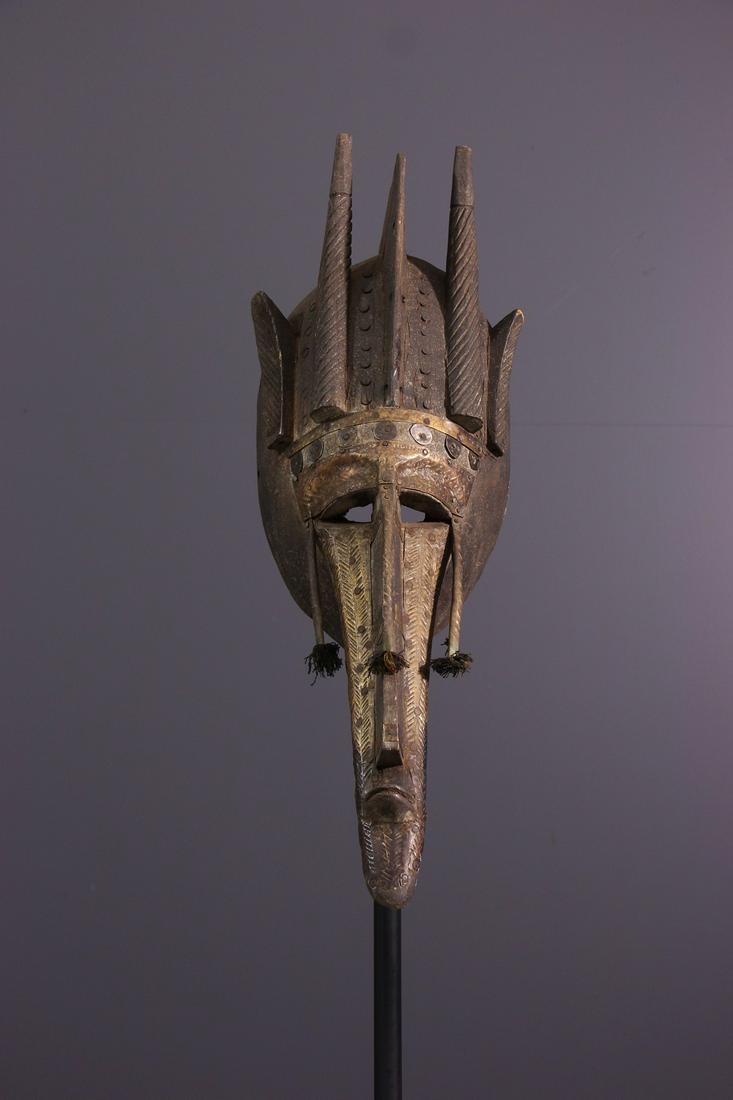 Markha N'tomo wood mask - Mali - African Art Tribal Art: Title: Markha N'tomo wood mask - Mali - African Art Tribal Art Description: Markha African art. The tall volume forming the forehead of this African mask is asked by a crest and appendages evoking hor