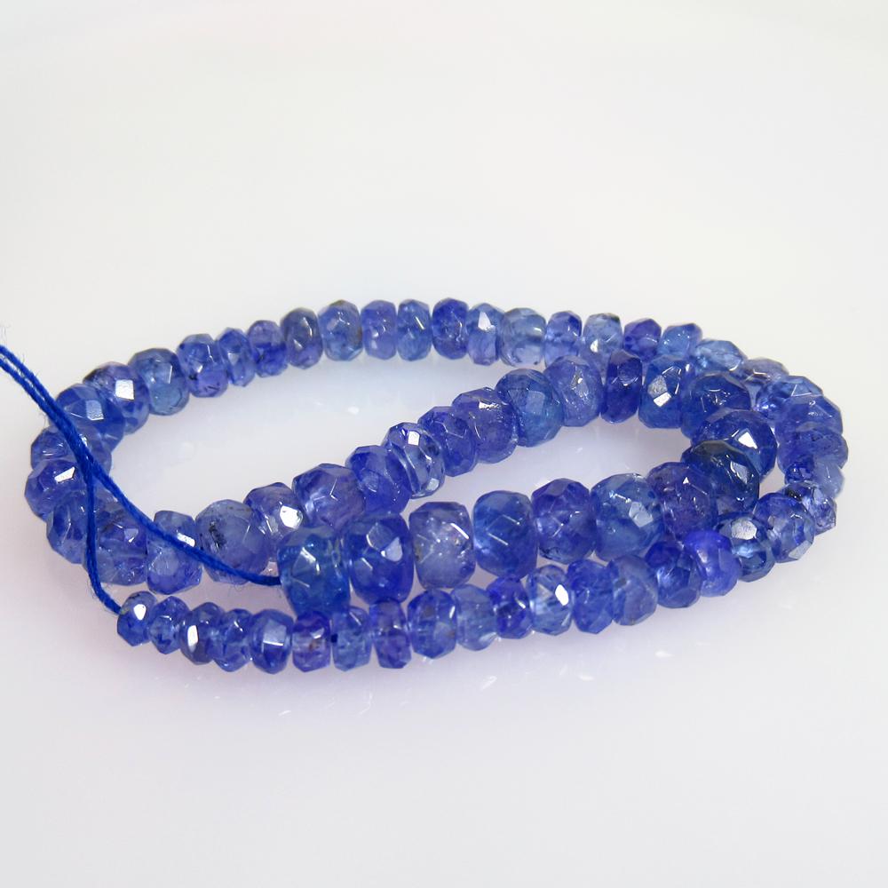 27.66 Ctw Natural 68 Drilled Tanzanite Round Beads: Title: 27.66 Ctw Natural 68 Drilled Tanzanite Round Beads Stone Clarity: Transparent Gemstones: Tanzanite Beads Size/Dimensions: 27.66 Carat Weights: 4.30 - 5.20 mm / 68 PC's Additional Information: D