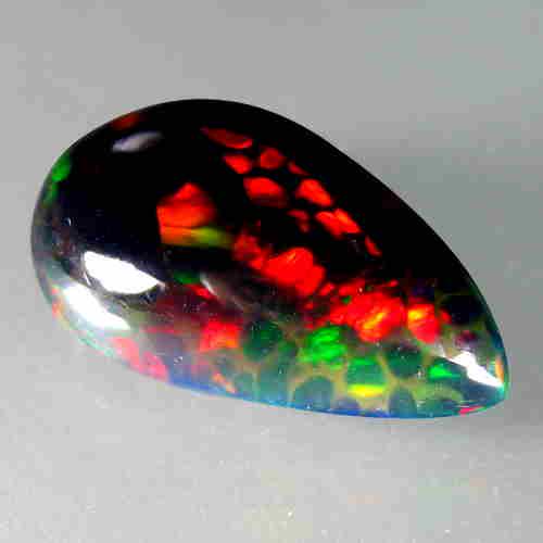 5.45Cts Natural Multi color Black Opal Pear Cabochon: Title: 5.45Cts Natural Multi color Black Opal Pear Cabochon Good Luster loose gemstone Carat Weights: 5.45 Size/Dimensions: 17.10x10.50x6.30 MM Additional Information: VVS QUALITY HEATED WITH PLAY OF 
