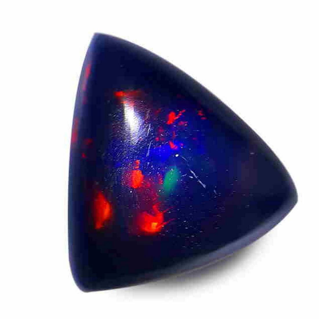 3.00 Ct EXCELLENT LUSTER Black Opal Trillion shape Good: Title: 3.00 Ct EXCELLENT LUSTER Black Opal Trillion shape Good Luster loose gemstone Carat Weights: 3 Size/Dimensions: 11.40x10.60x5.30 MM Additional Information: VVS QUALITY HEATED WITH PLAY OF COLOR