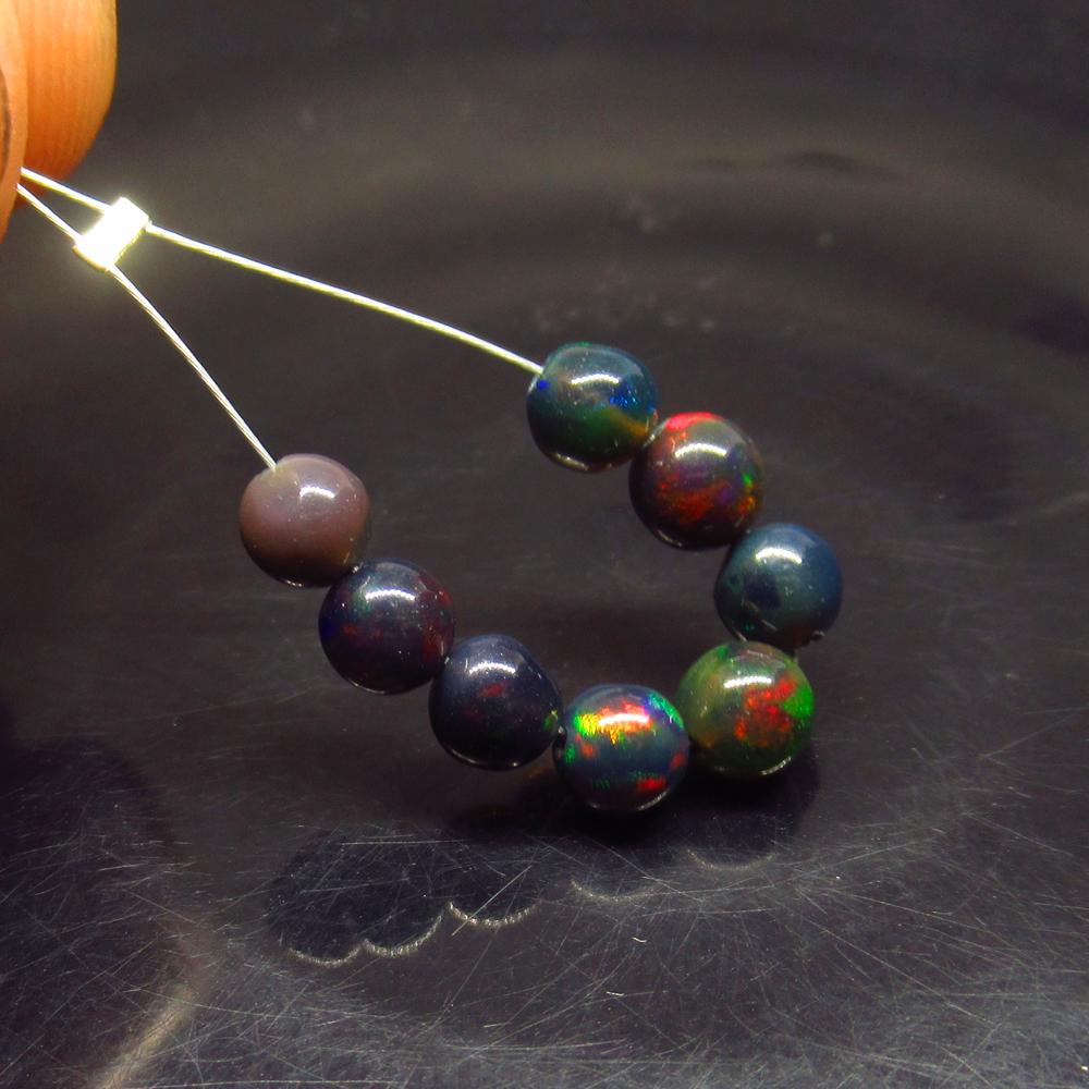 4.21 Ct Natural 8 Drilled Black Fire Opal Ball Beads (1 of 2)
