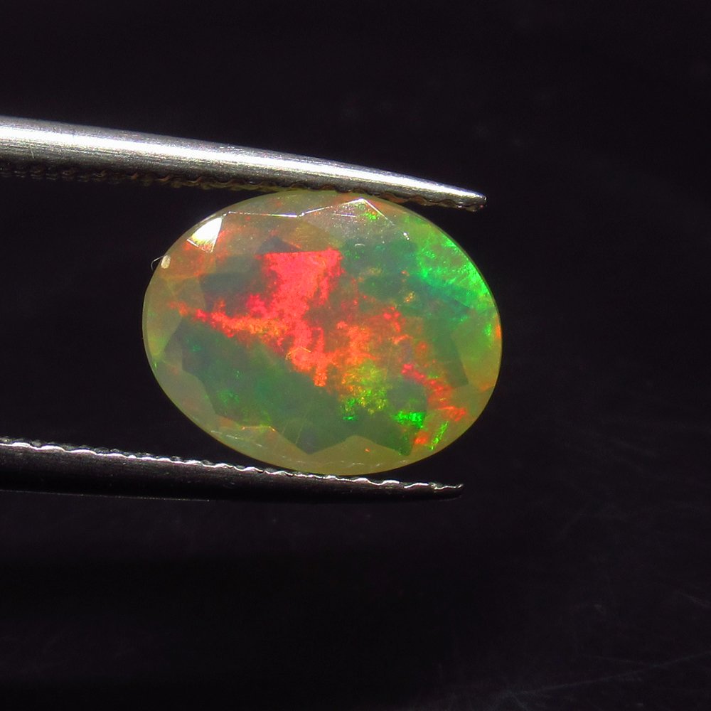 1.57 Ct Natural Multi-Color Faceted Fire Opal Oval Cut (1 of 2)