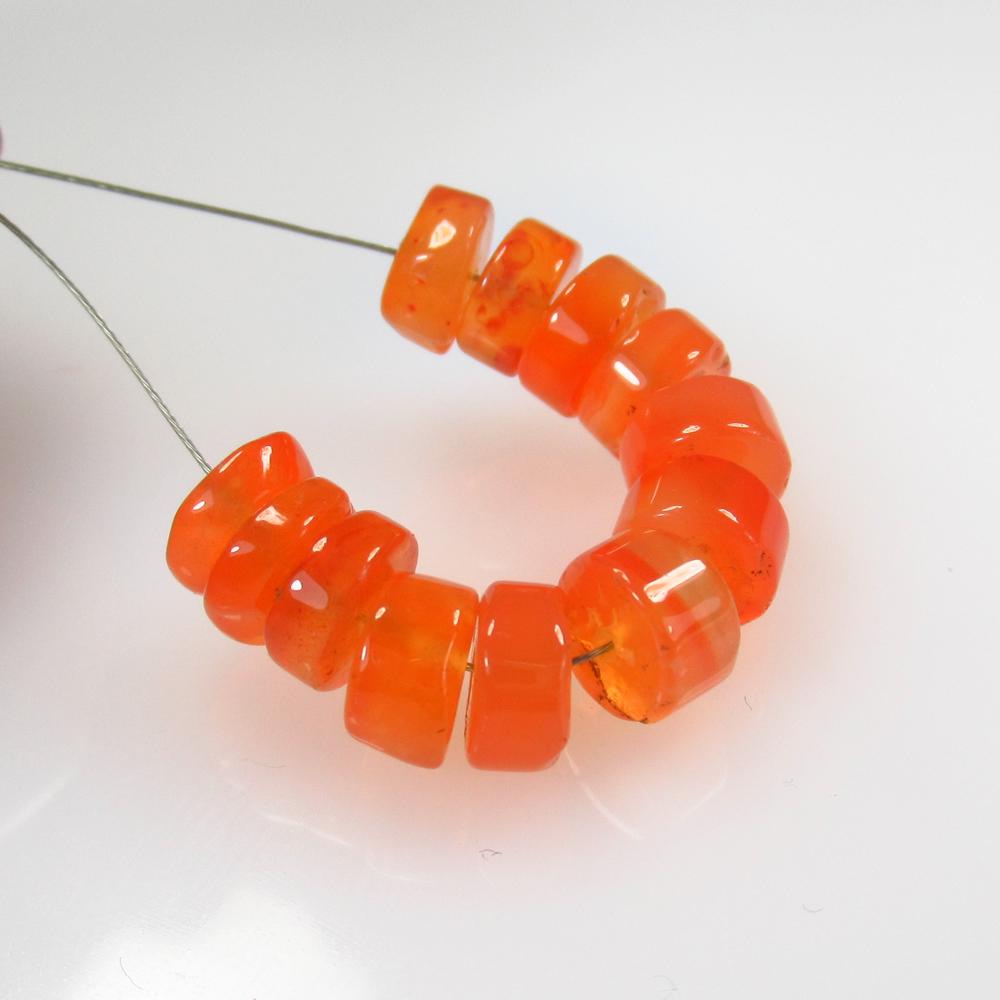 18.74 Ct 12 Orange Carnelian Round Beads: No Reserve! Title: 18.74 Ct 12 Orange Carnelian Round Beads Stone Clarity: Semi-Transparent Gemstones: Natural Carnelian Beads Carat Weights: 18.74 Size/Dimensions: 7.00 to 7.30 mm / 12 PC's Additiona