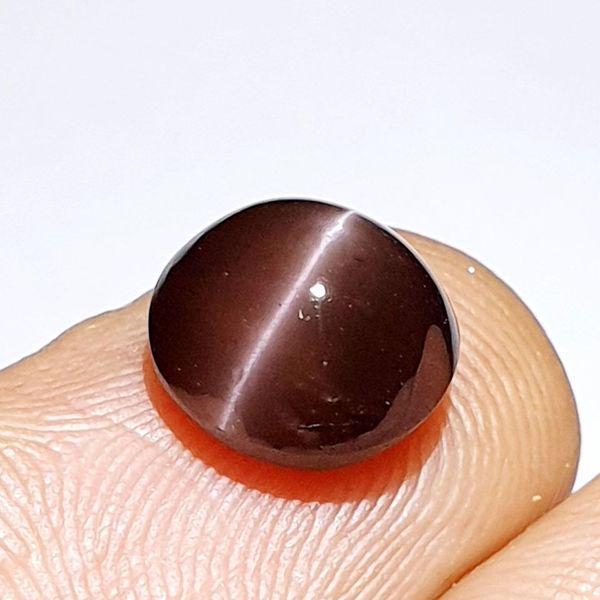 Natural Scapolite Cat's Eye 3.70 ct: No Reserve! Title: Natural Scapolite Cat's Eye 3.70 ct Color/Clarity: Opaque Gemstones: Loosegemstone Carat Weights: 3.7 Size/Dimensions: 9.30 x 9.30 x 6.00 Additional Information: Round - Africa Ship