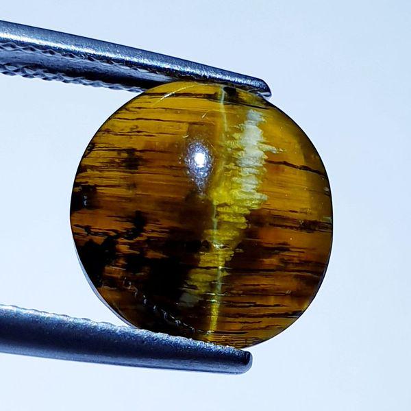 18.94 ct Natural Opal Cat's Eye: No Reserve! Title: 18.94 ct Natural Opal Cat's Eye Color/Clarity: Semi Transparent Gemstones: Loosegemstone Carat Weights: 18.94 Size/Dimensions: 17.00 x 13.80 x 12.90 Additional Information: Oval - A