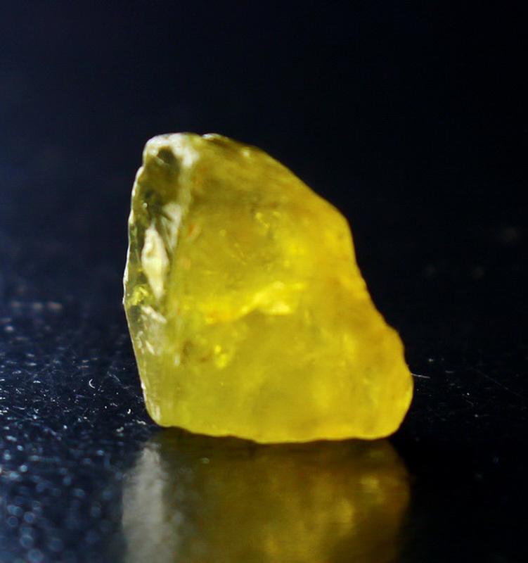 Natural & unheated~ Yellow Beryl Rough: Title: Natural & unheated~ Yellow Beryl Rough Color/Clarity: Yellow Gemstones: Rough Carat Weights: 9.05 Cts Size/Dimensions: 15x14x9 mm Reserve: $15.00 Shipping: Domestic: Flat-rate of $15.00 to any