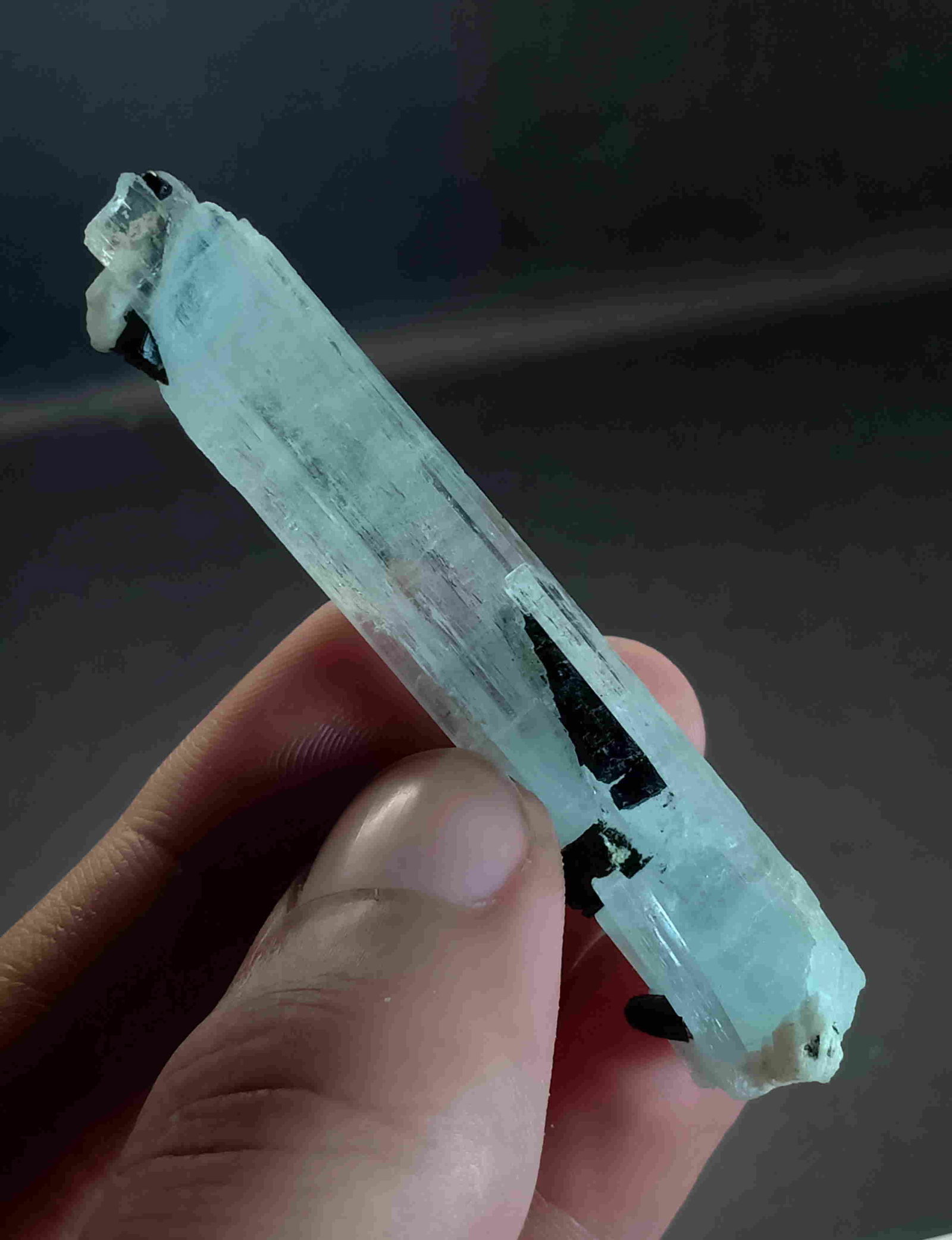 14 Gram Very Beautiful Natural Aquamarine With: Title: 14 Gram Very Beautiful Natural Aquamarine With Tourmaline Specimen Treatment: Natural Total Weights: 14 Gram Size/Dimensions: 69x12x10 mm Origin: Pakistan Reserve: $60.00 Shipping: Domestic