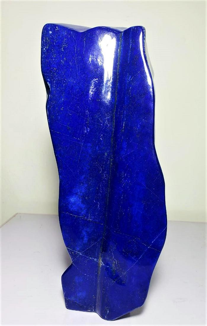 7.5 Kg Polished Lapis Lazuli Standing Tumble: Title: 7.5 Kg Polished Lapis Lazuli Standing Tumble Gemstones: Mineral Carat Weights: 7500 GRAMS Size/Dimensions: 30X10X7 Cm Additional Information: 7.5 Kg Polished Lapis Lazuli Standing Tumble Reserv