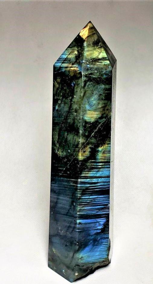 Polished Fire Labradorite Tower - 739 Grams: Title: Polished Fire Labradorite Tower - 739 Grams Gemstones: Mineral Carat Weights: 739 Grams Size/Dimensions: 185X54X47 mm Additional Information: Polished Fire Labradorite Tower - 739 Grams Reserve