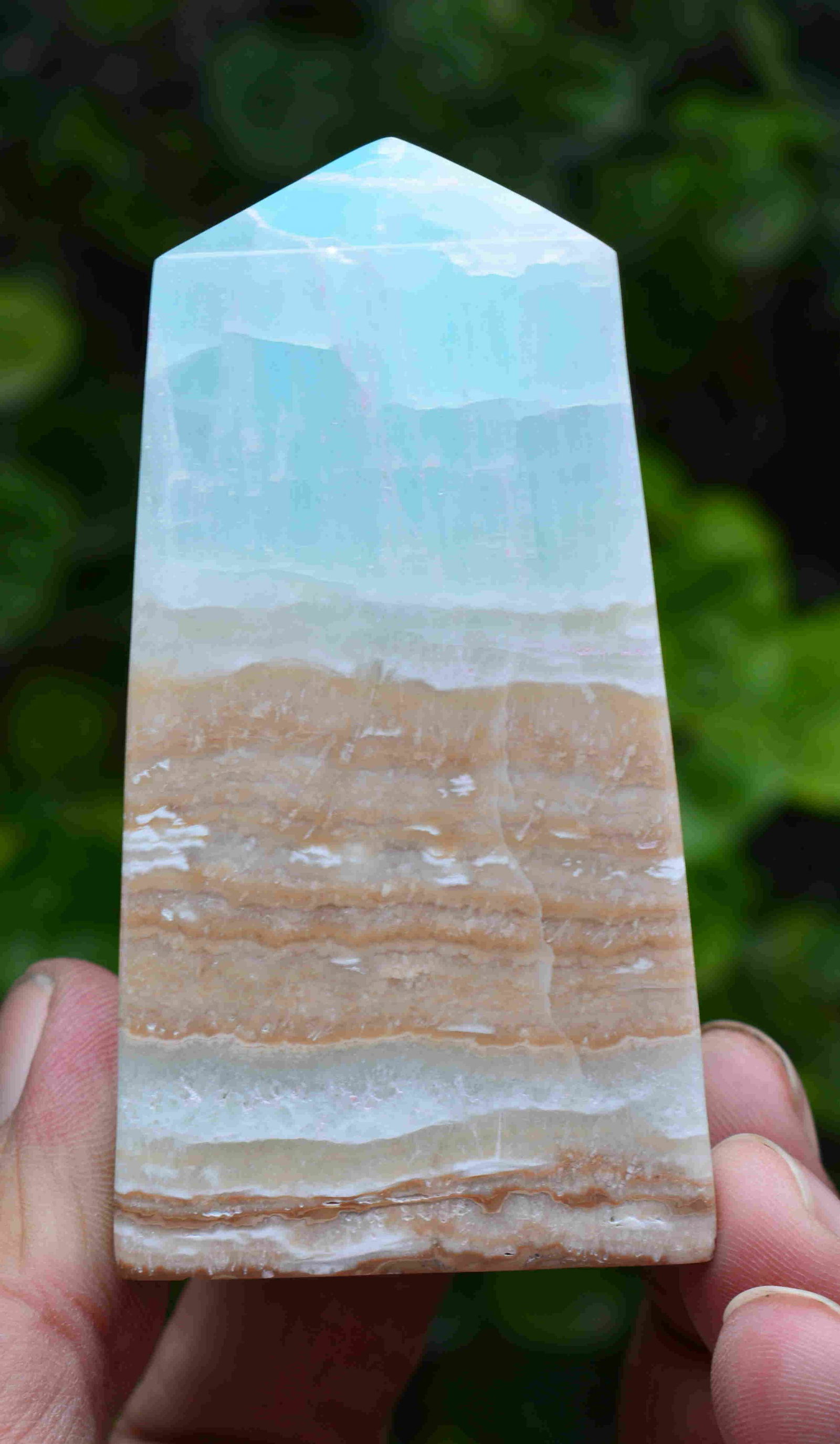 312 Grams Royal Blue Calcite Tower: Title: 312 Grams Royal Blue Calcite Tower Origin: Pakistan Weight: 312 Grams Size/Dimensions: 80x40x45 MM Additional Information: Natural Reserve: $40.00 Shipping: Domestic: Flat-rate of $25.00 to an