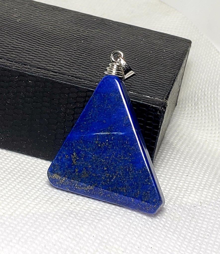 Sterling Silver Lapis Lazuli Pendant: Title: Sterling Silver Lapis Lazuli Pendant Gemstones: Mineral Size/Dimensions: 40X32X8 mm Additional Information: Sterling Silver Lapis Lazuli Pendant Reserve: $20.00 Shipping: Domestic: Flat-rate of
