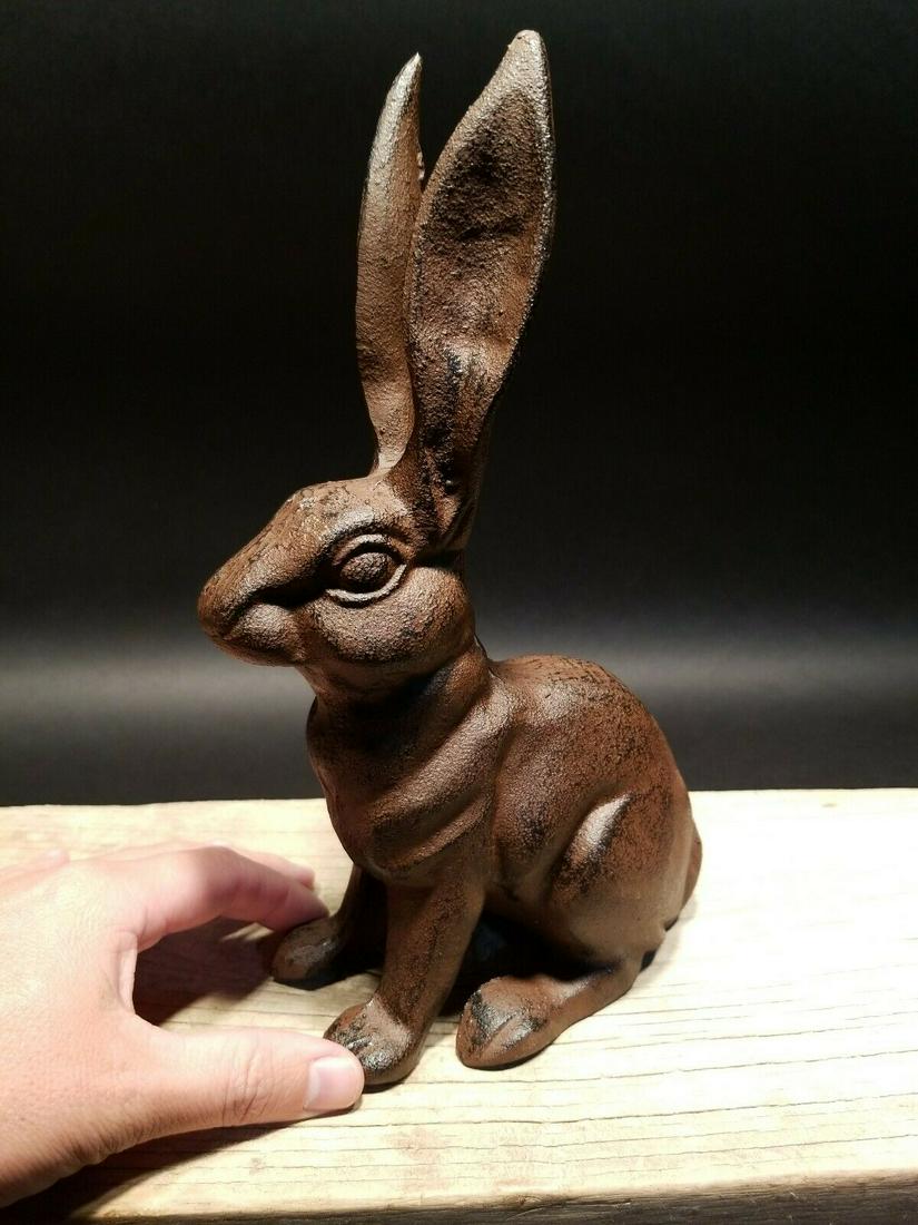 Cast Iron Garden Table Door Stop Rabbit Hare: 10 1/4" Tall x 6" Long x 3" Wide Nice Reproduction solid cast iron rabbit statue. This rabbit is much thicker, and heavier then other similar ones we have seen. Makes a great accent piece indoor or ou