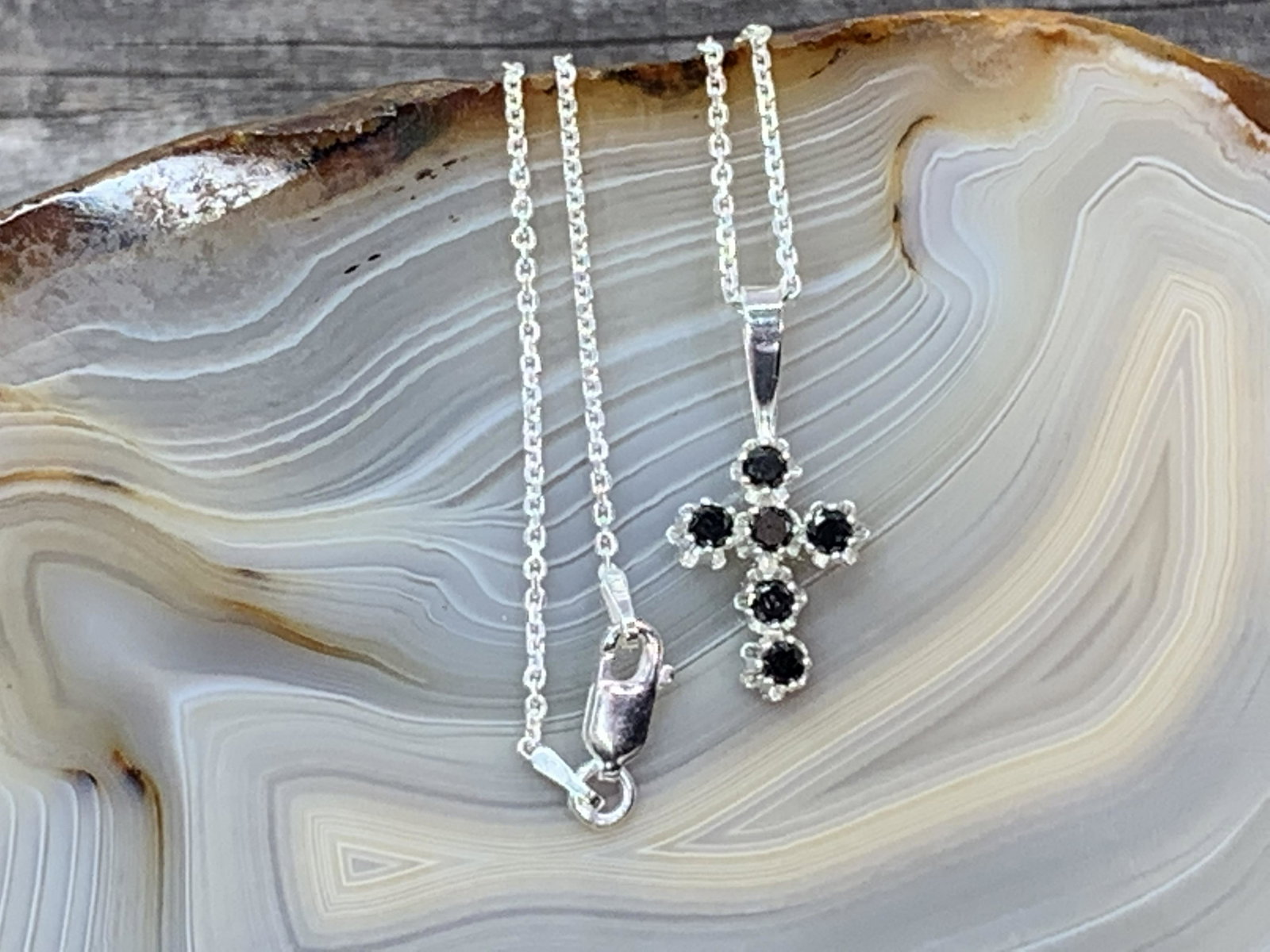 Black Diamond Cross Pendant .925 Sterling Necklace: No Reserve! Title: Black Diamond Cross Pendant .925 Sterling Necklace Materials:Sterling Silver Dimensions: 1 inch x 1/2 inch pendant 3 mm Shipping: Domestic: Flat-rate of $7.00 to anywhere within the