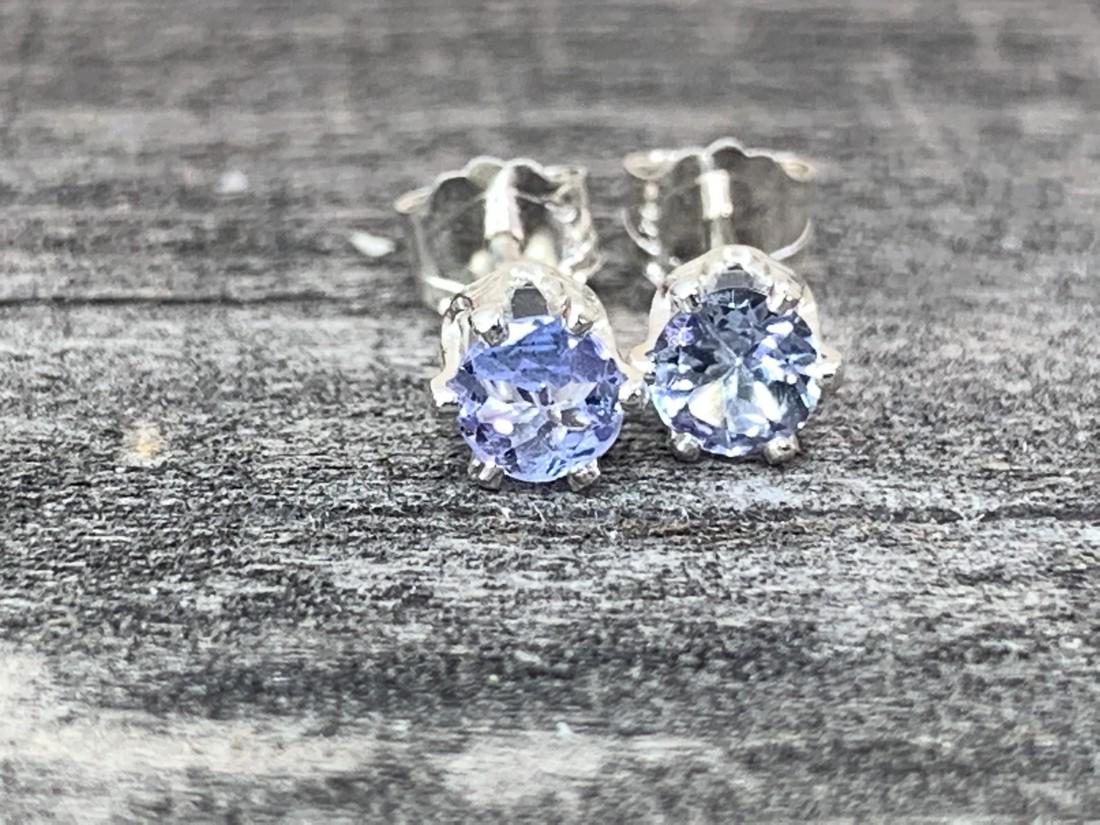 Tanzanite Natural Gemstone .925 Sterling Earrings: No Reserve! Title: Tanzanite Natural Gemstone .925 Sterling Earrings Materials:Sterling Silver Dimensions: 4 mm Shipping: Domestic: Flat-rate of $7.00 to anywhere within the contiguous U.S. Internatio
