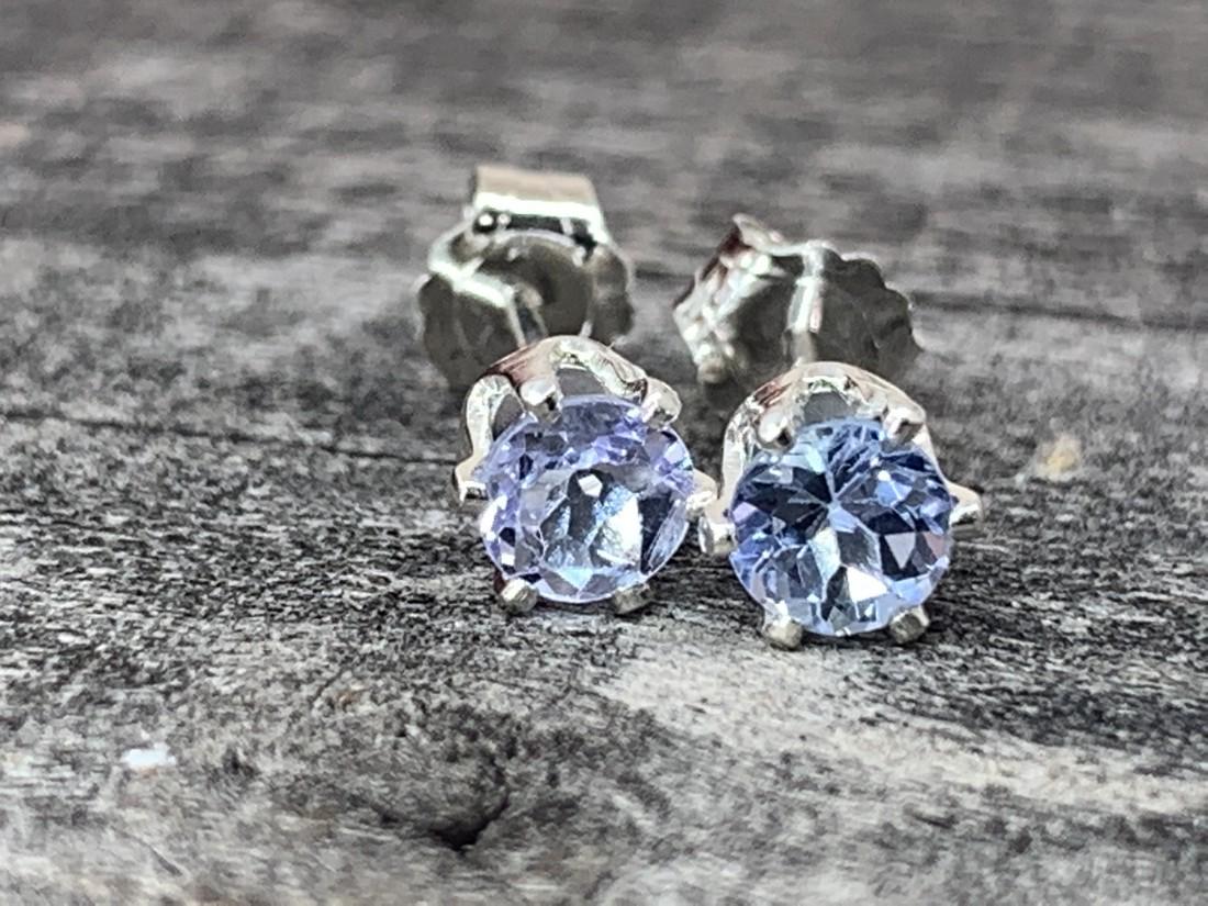 Tanzanite Natural Gemstone .925 Sterling Earrings: No Reserve! Title: Tanzanite Natural Gemstone .925 Sterling Earrings Materials:Sterling Silver Dimensions: 4 mm Shipping: Domestic: Flat-rate of $7.00 to anywhere within the contiguous U.S. Internatio