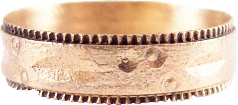 SUPERB VIKING WEDDING RING 900-1050 AD SZ 7 ¼: Gilt bronze, size 7 ¼ with broad flat face, 4.9mm width. Intricate stippled edges and a pattern of 5 pairs of dots. Each pair of uniformly offset form and enclosing three uniform elongated ovals.