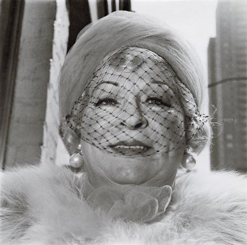 DIANE ARBUS - Woman with a Veil on Fifth Avenue, NYC: Artist: DIANE ARBUS Title: Woman with a Veil on Fifth Avenue, NYC, 1968 Medium: Photo Litho, 1972, USA Dimensions: 8.25x8.2" Description: Heat Wax Mounted on 11x14" Conservation Board Artist Bio: Dian