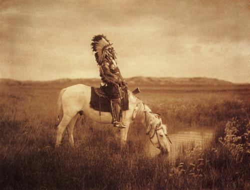 EDWARD CURTIS - An Oasis in the Bad Lands, 1905: Artist: EDWARD CURTIS Title: An Oasis in the Bad Lands, 1905 Medium: Photo Litho, 2001, Italy Dimensions: 7.05x5.4" Description: Heat Wax Mounted on 8.5x11" Conservation Board Artist Bio: Edward Sheri