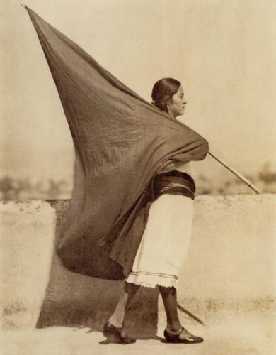 TINA MODOTTI - Woman With Flag, 1928: Artist: TINA MODOTTI Title: Woman With Flag, 1928 Medium: Photo Litho, 2002, Hong Kong Dimensions: 7.45x9.55" Description: Heat Wax Mounted on 11x14" Conservation Board Artist Bio: Tina Modotti (1896
