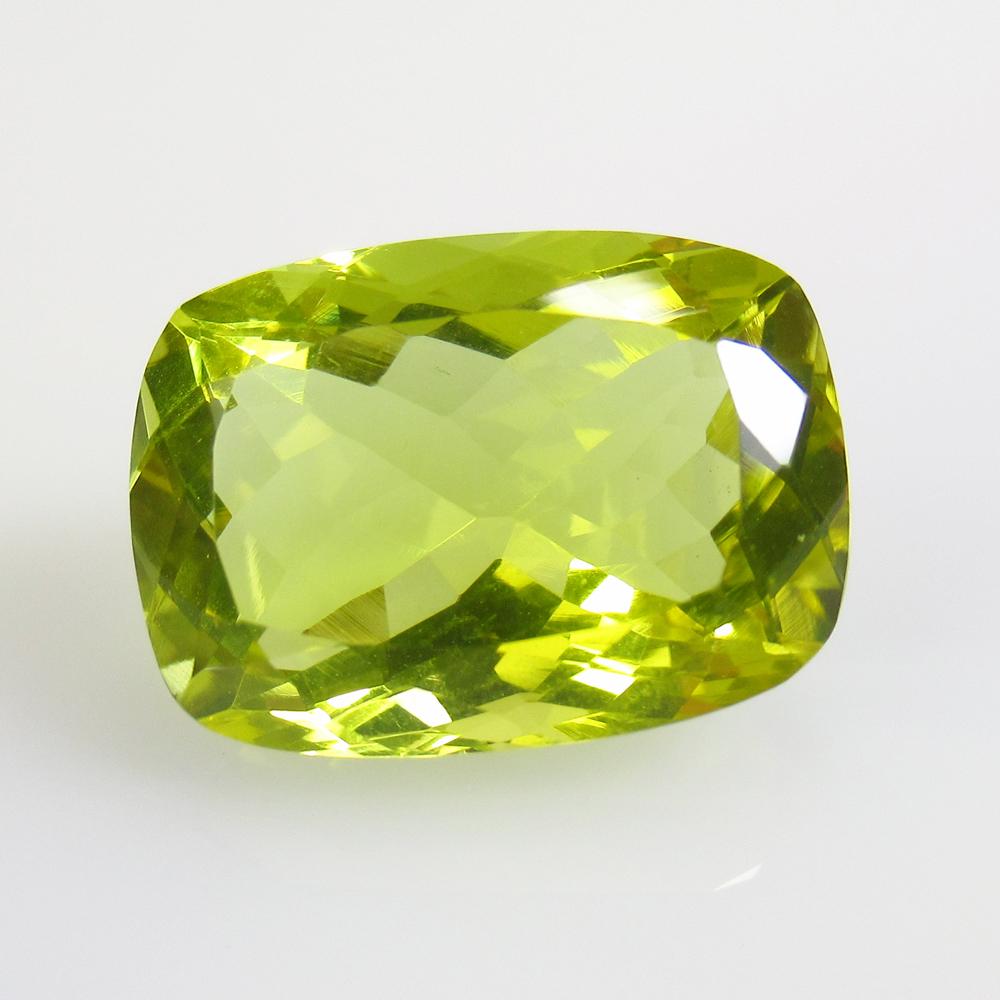 13.50 Ctw Natural Lemon Quartz Cushion Cut: No Reserve! Title: 13.50 Ctw Natural Lemon Quartz Cushion Cut Stone Clarity: VVS Gemstones: Lemon Quartz Size/Dimensions: 13.5 Carat Weights: 18.00 x 13.00 x 9.20 mm Additional Information: Good Luste