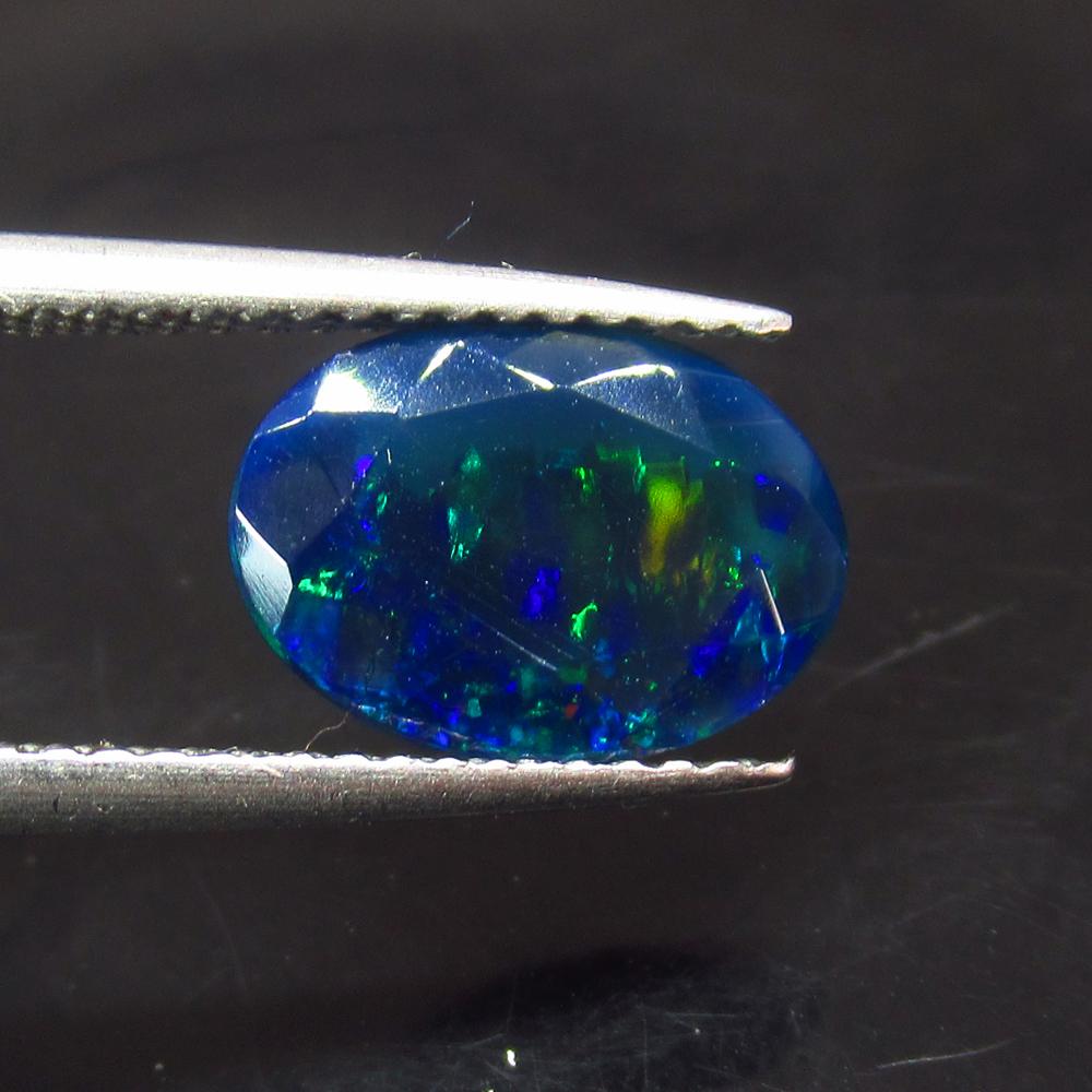 1.31 Ct Natural Ethiopian Black Fire Opal Oval Cut (1 of 2)