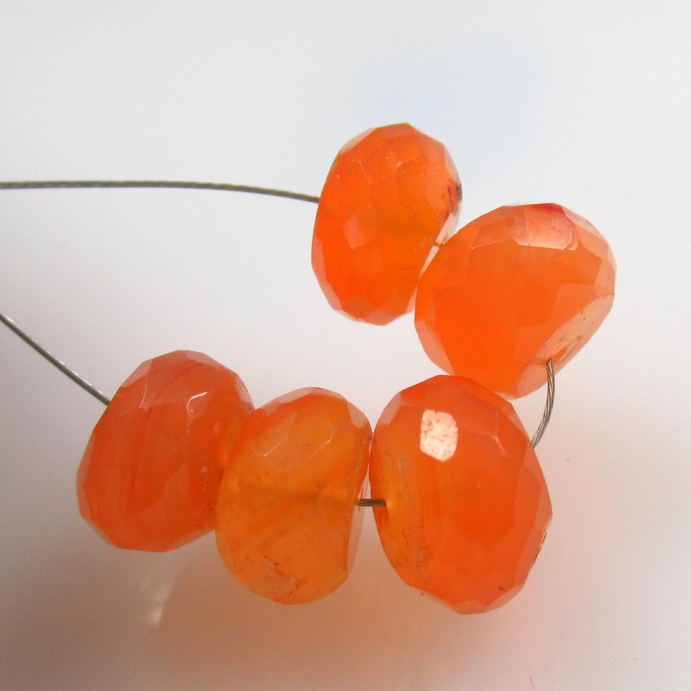 18.50 Ct Natural 5 Orange Carnelian Round Beads: No Reserve! Title: 18.50 Ct Natural 5 Orange Carnelian Round Beads Stone Clarity: Semi-Transparent Gemstone: Natural Carnelian Beads Carat Weight: 18.50 Size/Dimensions: 8.60 to 9.80 mm / 5 PC's Addit