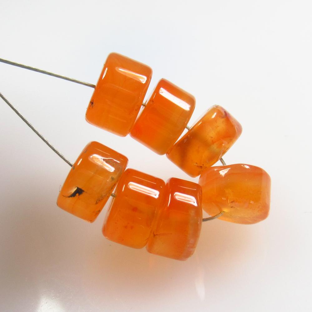 14.44 Ct Natural 7 Orange Carnelian Round Beads: No Reserve! Title: 14.44 Ct Natural 7 Orange Carnelian Round Beads Stone Clarity: Semi-Transparent Gemstone: Natural Carnelian Beads Carat Weight: 14.44 Size/Dimensions: 7.00 to 7.50 mm / 7 PC's Addit