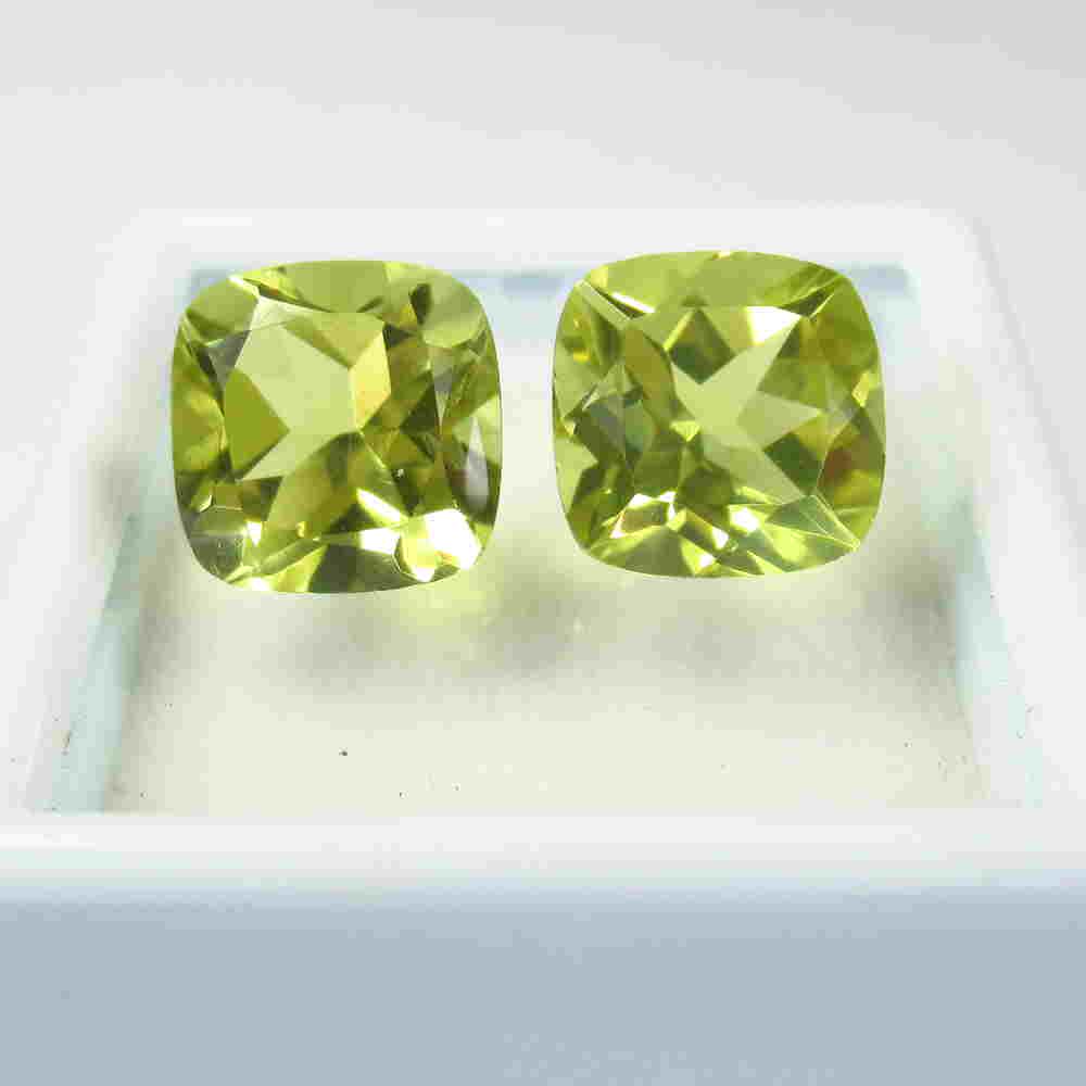 6.10 Ctw Natural Lemon Quartz Cushion Pair: Title: 6.10 Ctw Natural Lemon Quartz Cushion Pair Stone Clarity: VVS Gemstone: Lemon Quartz Carat Weight: 6.10 Size/Dimensions: 8.90 x 8.90 x 6.60 mm / 2 PC's Additional Information: Good Luster / Top