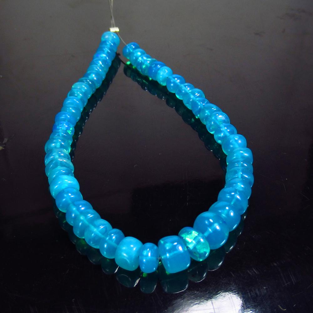 2.30 Ct Natural 50 Drilled Neon Blue Fire Opal Beads (1 of 2)