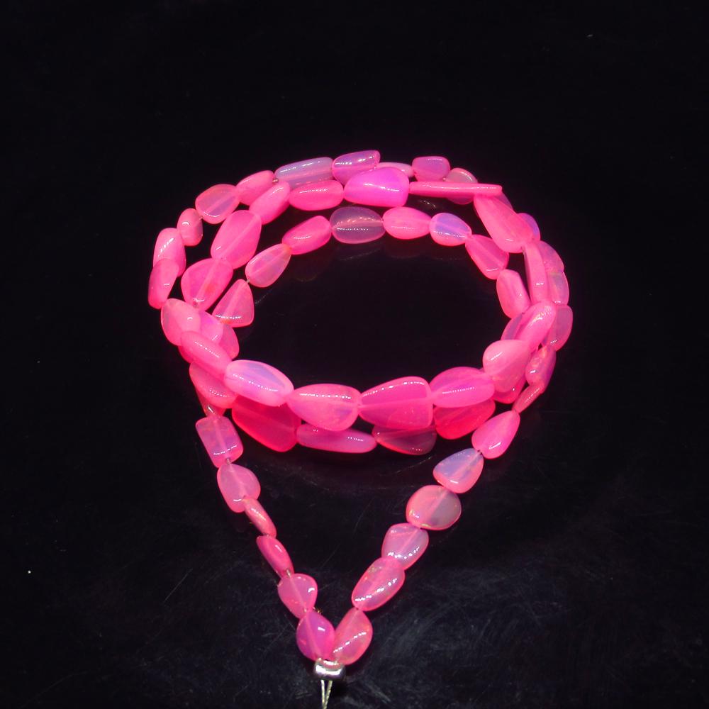 26.32 Ct Natural 68 Drilled Pink Fire Opal Beads: Title: 26.32 Ct Natural 68 Drilled Pink Fire Opal Beads Stone Clarity: Transparent Gemstones: Natural Pink Opal Beads Carat Weights: 26.38 Size/Dimensions: 5.0x4.1 to 12.0x8.9 mm / 68 PC's Additional 