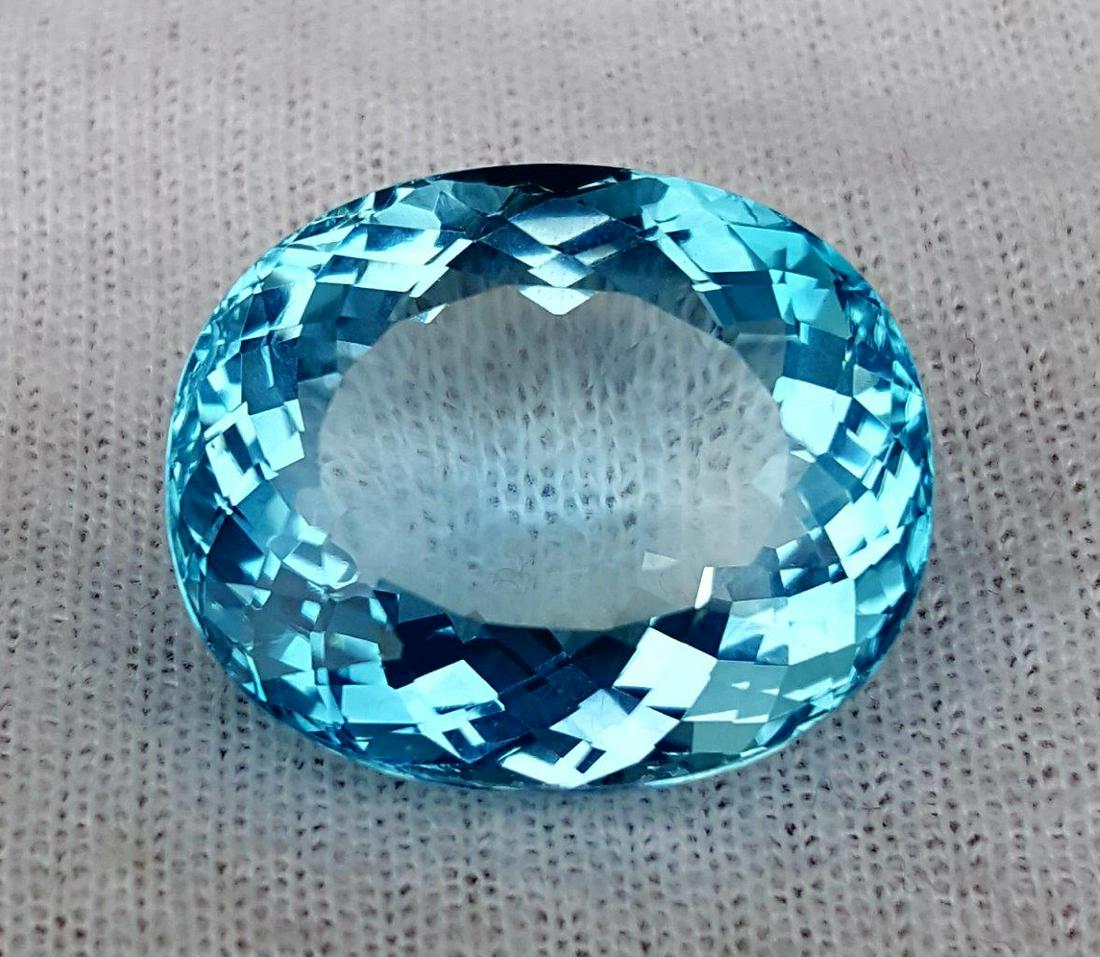 48 Carats Supreme Quality Natural Swiss Blue Topaz: Title: 48 Carats Supreme Quality Natural Swiss Blue Topaz 23X19X14 mm Origin: Afghanistan Additional Information: 48 Carats Supreme Quality Natural Swiss Blue Topaz 23X19X14 mm Reserve: $170.00 Shippi