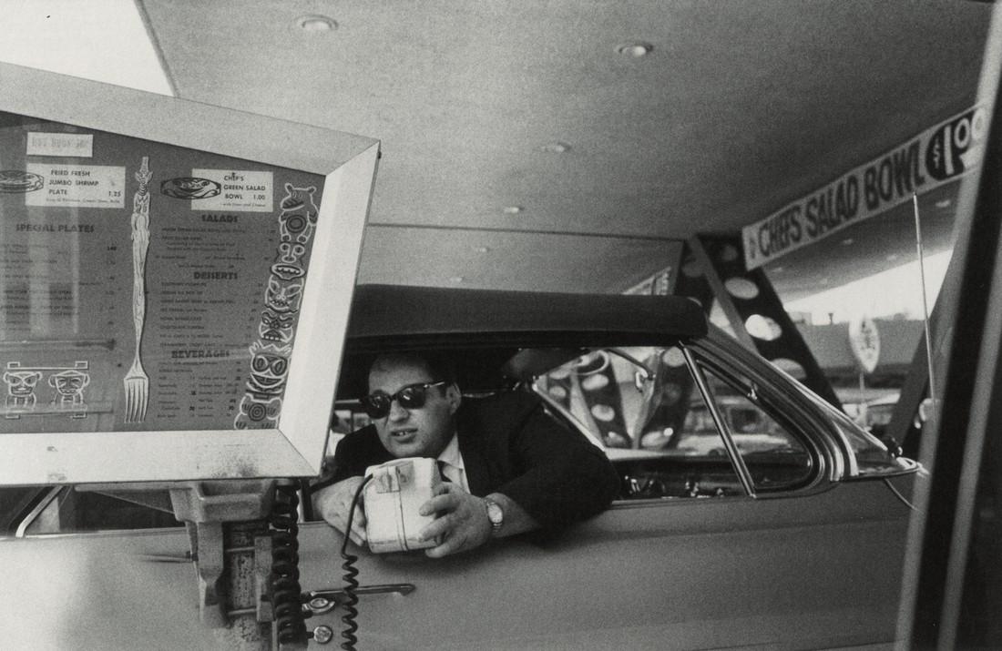 BRUCE DAVIDSON - Drive-Thru, Los Angeles, CA, 1964: Artist: BRUCE DAVIDSON Title: Drive-Thru, Los Angeles, CA, 1964 Medium: Photo Litho, 2016, Spain Dimensions: 8.6x5.6" Description: Heat Wax Mounted on 8.5x11" Conservation Board Artist Bio: Bruce Davi