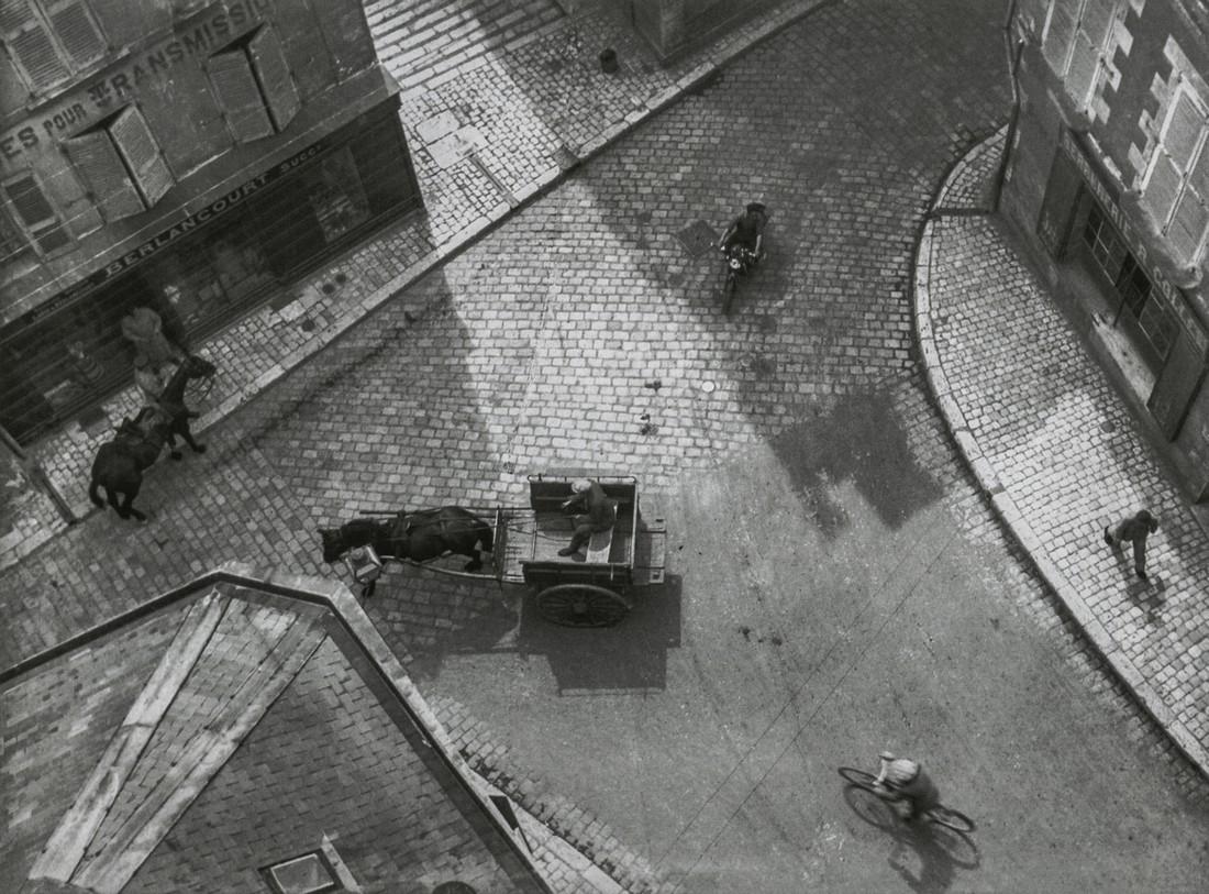 ANDRE KERTESZ - Carrefour (Crossroads), 1930: Artist: ANDRE KERTESZ Title: Carrefour (Crossroads), 1930 Medium: Photo Litho, 1999, Italy Dimensions: 7.7x5.7" Description: Heat Wax Mounted on 11x14" Conservation Board Artist Bio: Andre Kertesz, bo