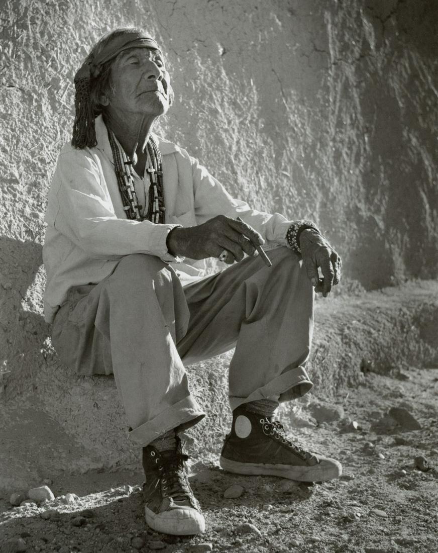 LEE MARMON - White Man's Moccasins (Jeff Sousea): Artist: LEE MARMON Title: White Man's Moccasins (Jeff Sousea), Laguno Pueblo, 1954 Medium: Photo Litho, 2002, Hong Kong Dimensions: 7.4x9.3" Description: Heat Wax Mounted on 11x14" Conservation Board 