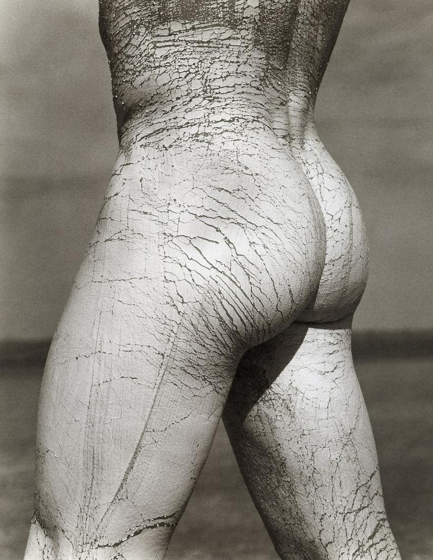 HERB RITTS - Paul, Rear View, El Mirage, 1991: Artist: HERB RITTS Title: Paul, Rear View, El Mirage, 1991 Medium: Photo Litho, 1999, France Dimensions: 8.45x10.9" Description: Heat Wax Mounted on 12x16" Conservation Board Artist Bio: Herb Ritts (1