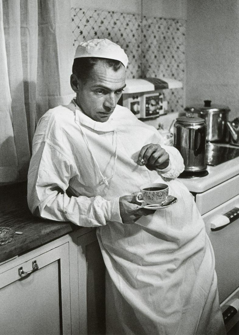 W. EUGENE SMITH - Dr. Ceriani with Coffee Cup, 1948: Artist: W. EUGENE SMITH Title: Dr. Ceriani with Coffee Cup, 1948 Medium: Photo Litho, 1999, Hong Kong Dimensions: 5.15x7.2" Description: Heat Wax Mounted on 8.5x11" Conservation Board Artist Bio: W. E