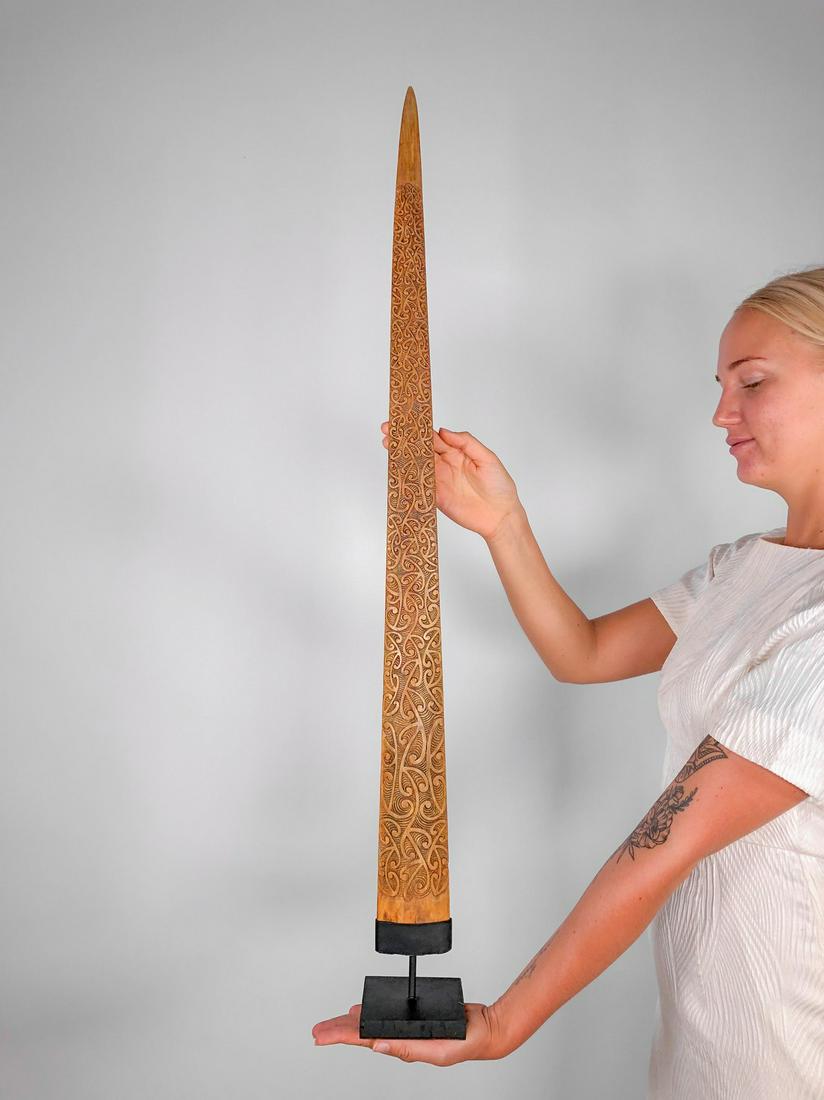 Traditional Maori Style Mangapore carved swordfish tusk: Title: Traditional Maori Style Mangapore carved swordfish tusk Maker: Unknown Origin: Indonesia Date/Period: 2019 Materials: Bone Dimensions:Height including stand 94 cm / 37 inches Description: This 