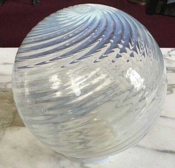 Vintage Phoenix Glass Opalescent Swirl Glass Hanging: For sale is a lovely vintage opalescent Phoenix swirl glass hanging light. The light is in very good condition it comes with the fixture which has some wear a nine link chain and a glass globe in very