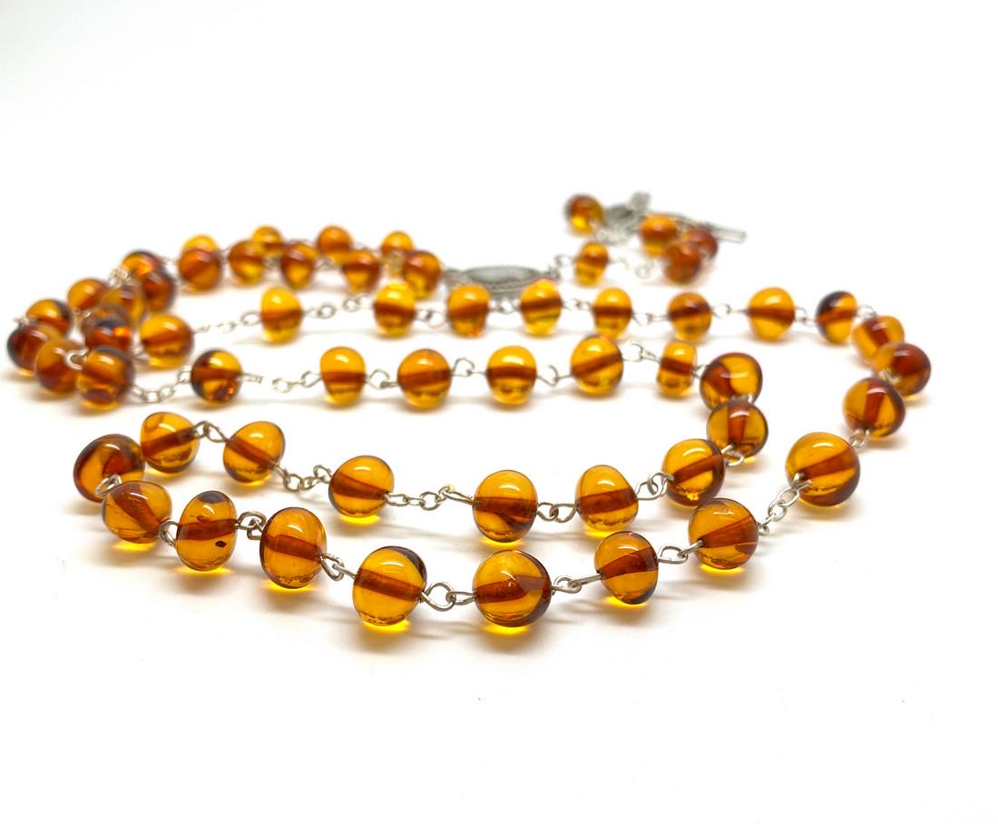 Vintage amber Catholic rosary 5 decades & cross: Title: Vintage amber Catholic rosary 5 decades & cross Maker: Unknown Origin: Unknown Date/Period: 20th century Materials: Amber Size:Bead size: 9.0 mm Bead size: 0.354 inches Description: Vintage amb