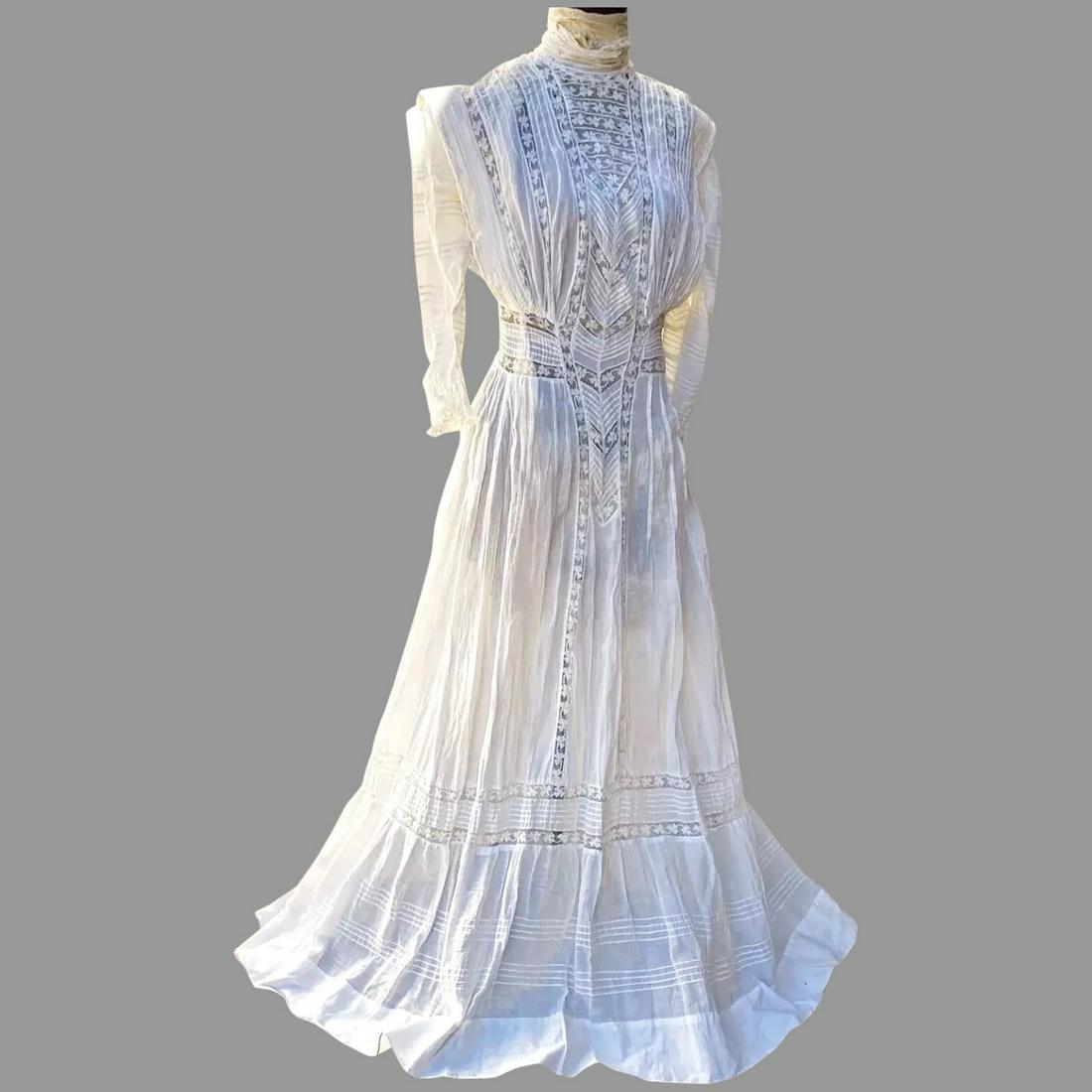 Antique Edwardian Tea dress Clover Lace High Neck: Stunning Edwardian Lawn Tea Dress in fine cotton Batiste . Pin Tucks and Clover amazing fine lace. High neck fastens down the back with Hook & Eye There are some repairs along the Arms and a few throu