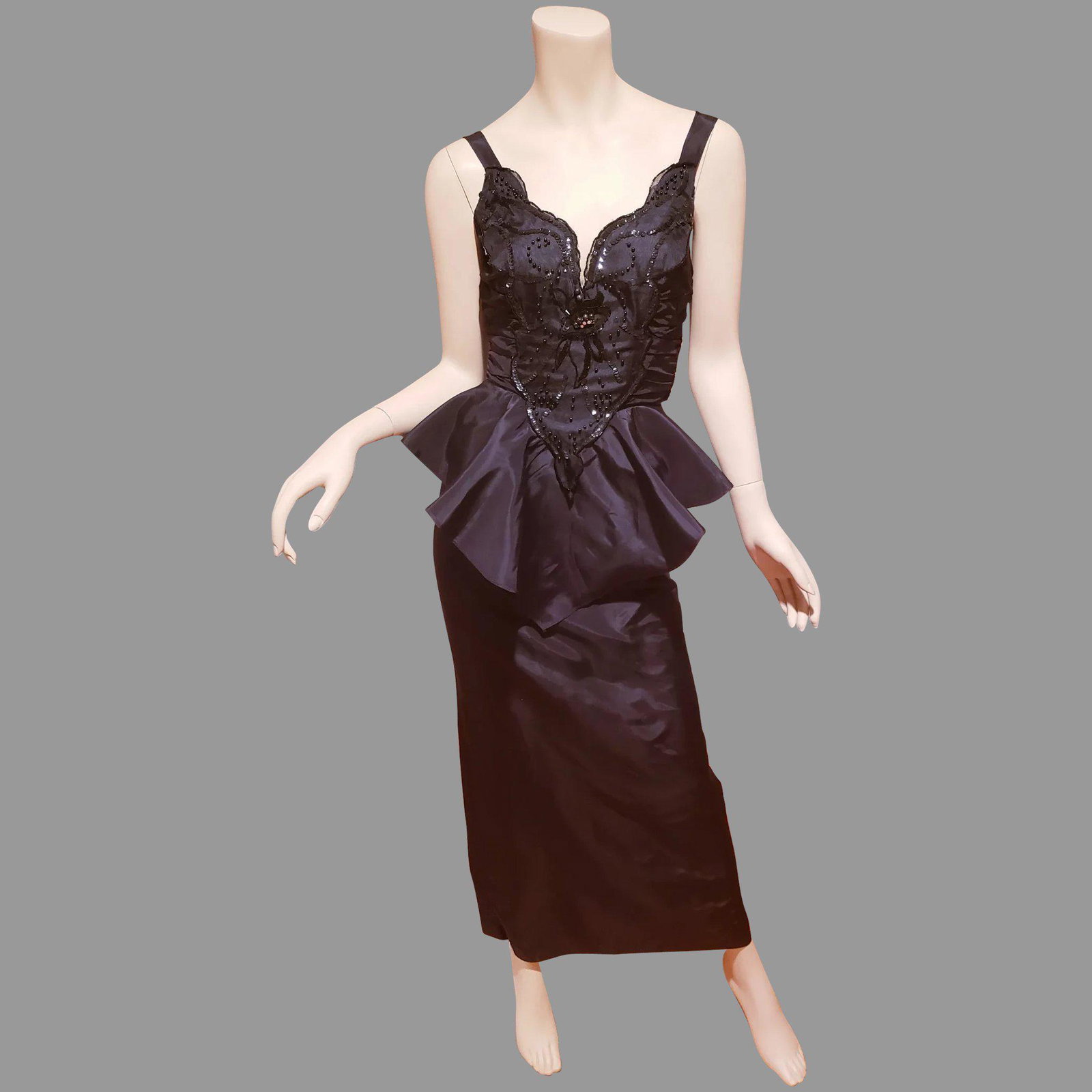Formal Peplum gown jet beaded bodice cross over back: This one is a beauty by Okada, Shantung Taffeta. Jet beaded and sequined at front back zipper and Peplum all around the waistline. Bust-34-35" Waist-26" Hip-38" In very good vintage condition Reserve:
