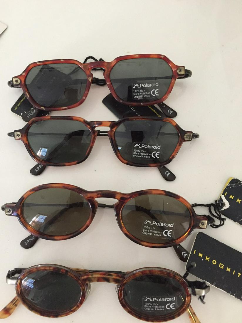 4 pair Vintage Polaroid sunglasses: Title: 4 pair Vintage Polaroid sunglasses Date/Period: 20th Century Materials: Plastic Dimensions: Universal Additional Information: Reflect glare. Also good for fishing and hunting Reserve: $20.00 Sh