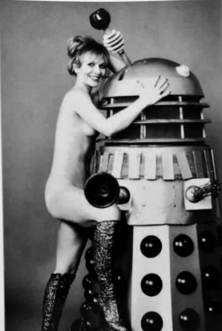Dr Who [?] Robot and Woman: Title: Dr Who [?] Robot and Woman Date/Period: Unknown Additional Information: Reprinted from the negative. 4"x6" Reserve: $5.00 Shipping: Domestic: Flat-rate of $5.00 to anywhere within the contiguou