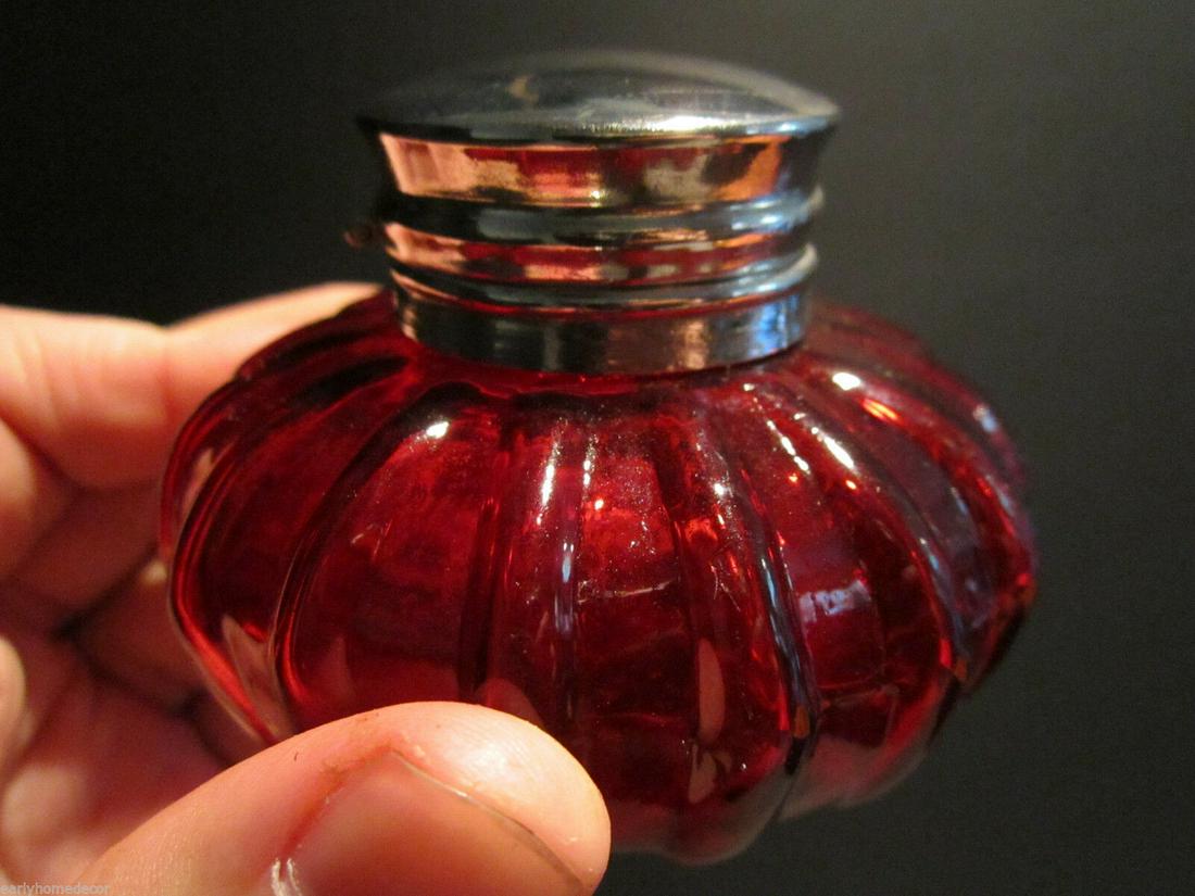 Round Red Thick Glass Inkwell Ink pot Bottle: Charming 2 1/4" High x 3 1/4" wide Charming Reproduction antique red glass inkwell. Very heavy thick glass each with charming subtle signs of being hand made. The hinged shiny lid is nickel plated bra