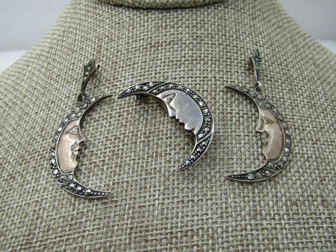 Vintage Sterling Silver Moon Brooch & Earrings Set,: Vintage Sterling Silver Moon Brooch & Earrings Set, Marcasites, 10.55 grams. The pendant is 1.25" tall and appx. 3/4" wide with a smooth face and edges with marcasites. The earrings have a pointed stu