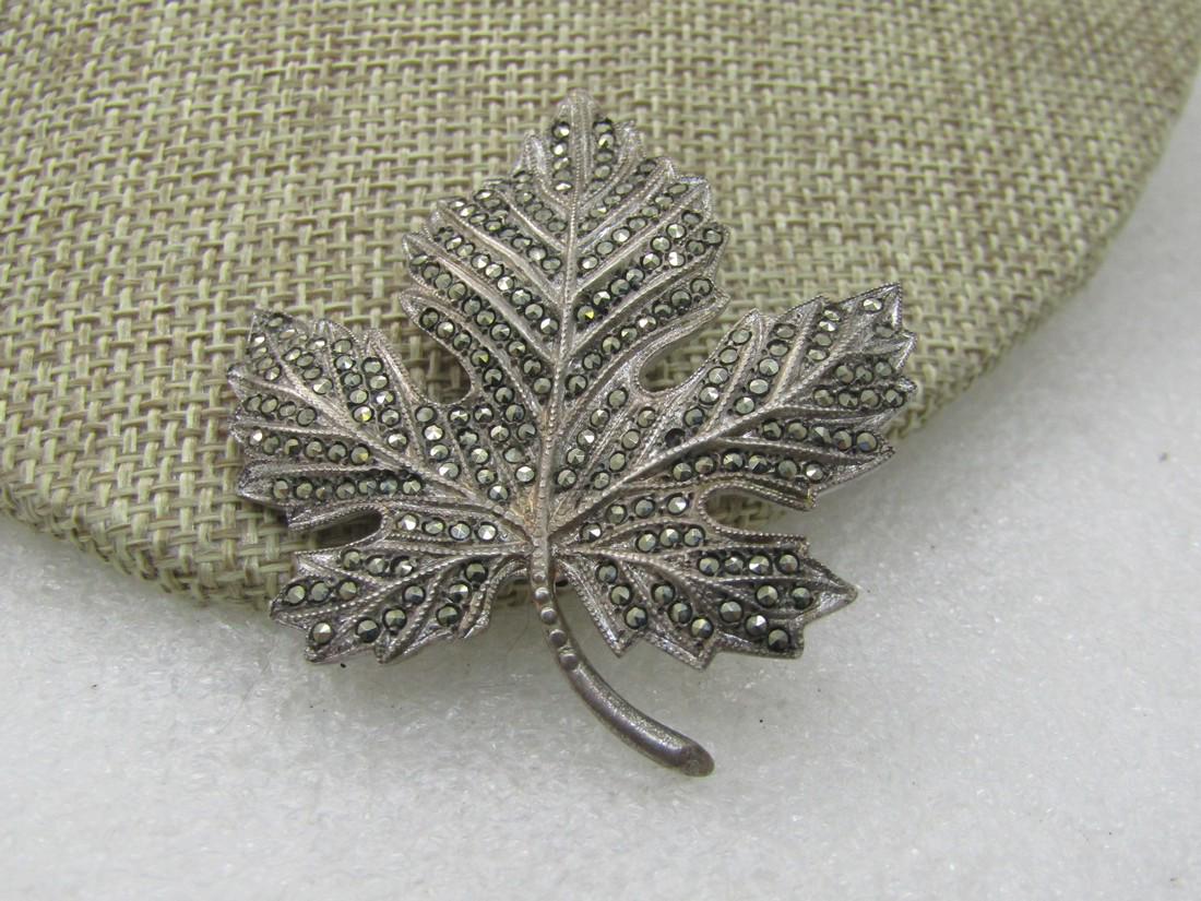 Vintage Sterling Marcasite Maple Leaf Brooch, 2",: Vintage Sterling Marcasite Maple Leaf Brooch, 2", 1940's-1950's. 2" tall and 1.75" wide. Exceptional quality with nice details and marcasites throughout. Unusual pinback dating it to mid-century. Mark