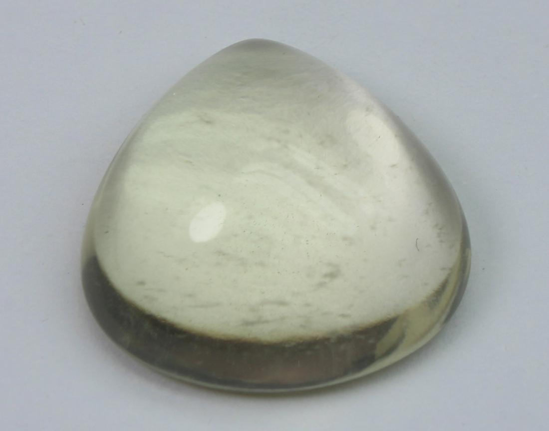 11.69 Ct Natural Lemon Quartz: No Reserve! Title: 11.69 Ct Natural Lemon Quartz Additional Information: Gemstone: Natural Lemon QuartzOrigin: Africa Weight: 11.69 Carats Measurements: 15.7x15.8x7.5 mm Shape / Cut: Pear Cabochon Col