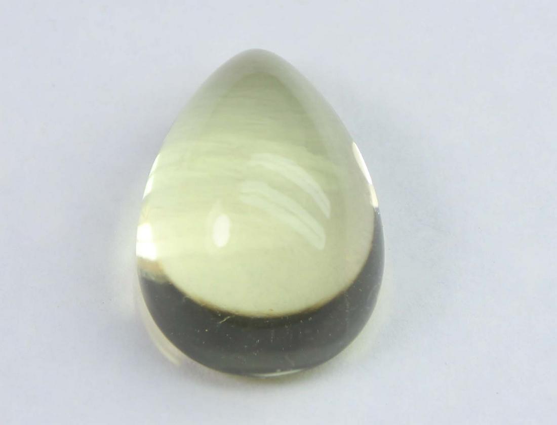 7.33 Cts Natural Lemon Quartz: No Reserve! Title: 7.33 Cts Natural Lemon Quartz Additional Information: Gemstone : Natural Lemon Quartz Shape : Pear CabochonMeasurements : 14.6x10.1x7.3 mmWeight : 7.33 CaratsColor : YellowTranspare