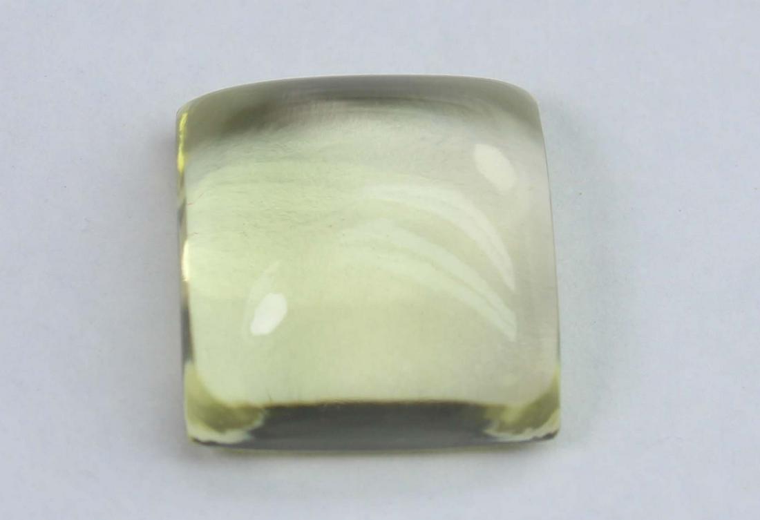 5.90 Cts Natural Lemon Quartz: No Reserve! Title: 5.90 Cts Natural Lemon Quartz Additional Information: Gemstone : Natural Lemon Quartz Shape : Square CabochonMeasurements : 11x10.7x5.6 mmWeight : 5.90 CaratsColor : YellowTranspare